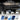 Front license plate holder on front bumper with protective weather-resistance icons