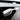 Steering column turn signal lever with printed vehicle and lighting symbols, matte dark gray.