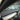 Dashboard cover with smooth gray surface, honeycomb vent panel, and green trim