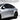 Low-profile rocker panel guards on Tesla Model YL preserving the factory side profile