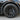 Dark gray wheel cover with turbine-style spokes and round center hub detail