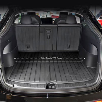 Custom-fit dark trunk side TPE covers with ribbed texture, installed in cargo area