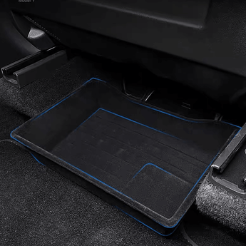 Under-seat storage organizer tray with dark surface and blue edge trim