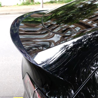Rear trunk spoiler with glossy black finish