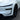 Front lower fog light trim with glossy black ABS surround, near wheel
