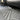 All-weather TPE floor mat with deep grooves and ridges, dark gray, front footwell view