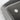 Close-up of all-weather TPE floor mat edge with textured surface and grommet, dark gray