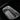 Car frunk LED light strip casting cool-white light over the storage tray
