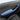 Alcantara door armrest cover for Tesla, charcoal with blue trim and switch cutouts