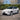 Tesla Model Y body kit front lip and side skirts, sport styling in dark finish