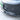Installed glossy black front bumper lip spoiler with three-piece lower trim