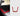 Red alcantara charging pad frame cover with U-shaped trim insert