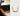 Orange alcantara charging pad frame cover with U-shaped trim insert