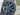 18-inch arachnid-style wheel cover close-up, dark spokes and center cap