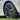 18-inch arachnid-style wheel cover, dark multi-spoke design around center cap