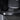 Seat area view of black carbon-fiber door sill protector with “MODEL Y”