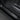 Carbon fiber door sill protector with Model Y label and button cutout, black