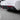 Carbon fiber rear diffuser with LED brake light, corner view with red LED strip