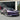 Side view of Carbon Fiber Side Skirts installed on 2024+ Tesla Model 3
