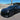 Carbon fiber V-style front lip splitter installed on black Tesla Model 3