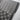 Checkered floor mat carpet insert with dark raised channels and stitched edges