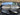 Two-section gray and reflective insulated front trunk cooler bag set in trunk