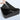 Black silicone door organizer tray with water poured into recessed area