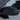 Tesla side mirror cover in solid dark black, smooth glossy surface