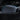 Tesla side mirror cover in glossy dark black, highlighted with blue outline