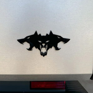 Black cyberbeast emblem badge on a vehicle panel