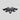 Black cyberbeast emblem badge with small red side tabs on a gray vehicle surface