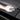 Tailgate protector pad with textured surface and hand wiping, dark gray
