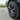 Close-up of satin black aero wheel cover with tire and multi-spoke rim