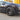 19-inch wheel cover hubcap with satin black multi-spoke pattern on car front wheel