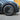19-inch wheel cover hubcap with satin black finish and multi-spoke spokes on front wheel