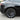 Rear wheel with dark satin aero wheel cover featuring a multi-spoke pattern