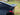 Glossy black rear spoiler wing with integrated aerodynamic center section