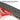 Carbon-fiber rear spoiler with protective tape, close-up installation edge