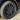 Wheel with multi-spoke alloy rim and circular center cap emblem