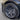 18-inch wheel with dark multi-spoke rim and circular center cap emblem