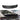 Black carbon fiber rear wing spoiler overlay with curved profile and visible weave
