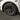 Black wheel cover with turbine spokes and center cap on a tire