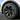Black wheel cover with multi-spoke turbine design and circular center cap on a tire