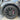 Gun grey wheel cover on 20-inch rim with multi-spoke design and center cap