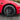 Matte black aero wheel cover with multi-spoke hub detail