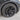Black wheel rim cover with five split spokes and center cap, close-up