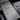 Real carbon fiber Console overlays installed on Tesla Model Y - detail shot
