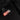 LED puddle light projector showing red striped badge glow on black textured sill