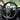 Black suede steering wheel cover with Tesla badge and textured grip surface