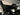 Black side window sunshades covering front and rear windows in Tesla